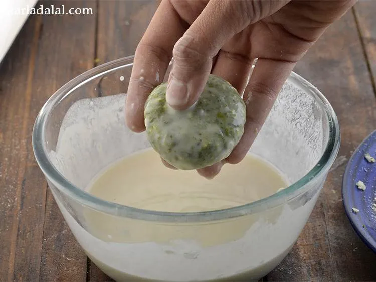 Step 27 – Dip the rolled and shaped kebab in the prepared flour-water paste.