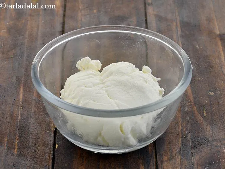 Step 30 – Take a separate bowl and add hung curd to it.