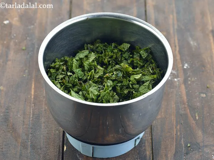 Step 25 – Wash, clean and roughly chop about 1 cup of mint leaves. Add them to a …