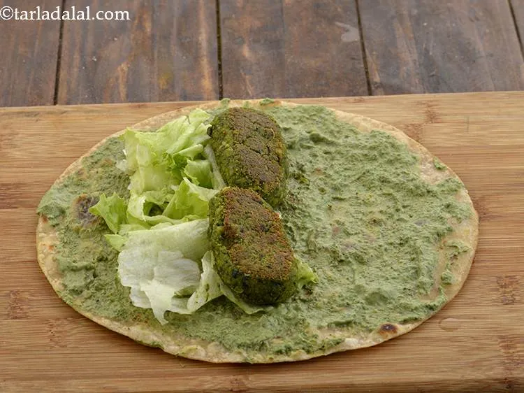 Step 40 – Place 2 <strong>Hara Bhara Tikkis</strong> over the lettuce.
