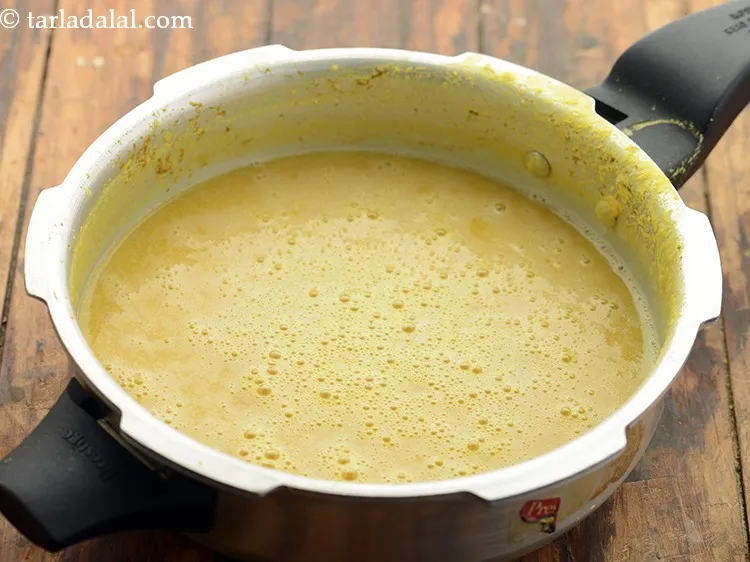 Step 8 – Whisk the dal well and keep aside. Stir so no lumps remain and remove the …