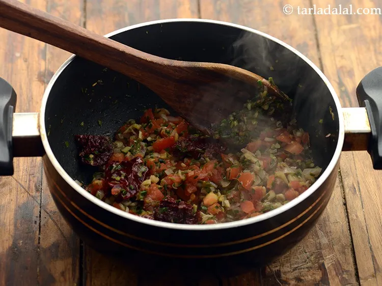 Step 19 – Mix well and saut&eacute; on a medium flame for 3 minutes or until the tomatoes …