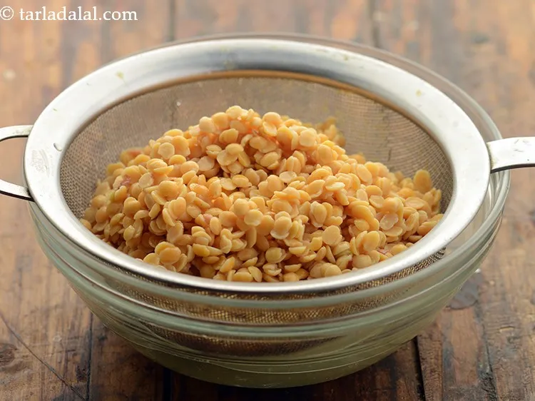 Step 4 – After 30 minutes, drain the toovar dal.