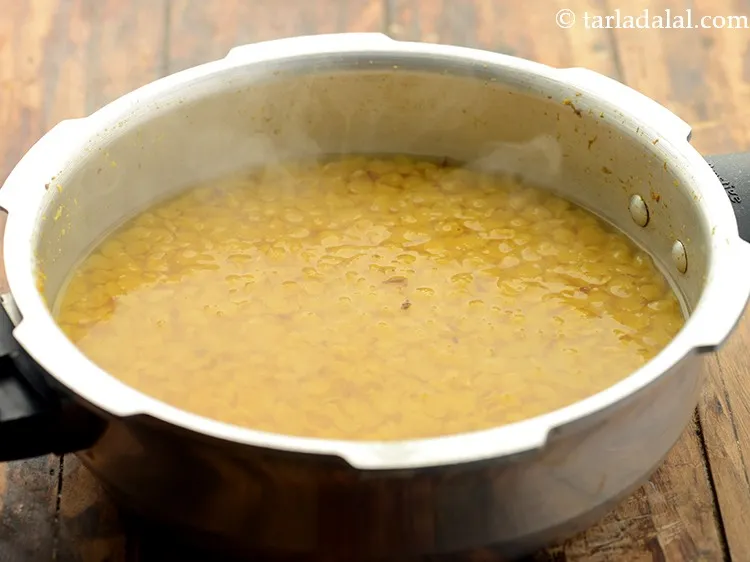 Step 8 – Pressure cook for 5 whistles. Allow the steam to escape before opening the lid. Different …
