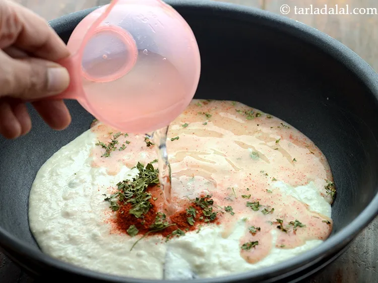 Step 41 – Add &frac14; cup of water. Add more or less water as per the gravy consistency …