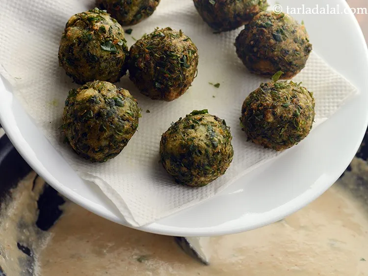 Step 47 – Just before serving, add the spinach koftas to the hot gravy. This ensures the kofta&rsquo;s …