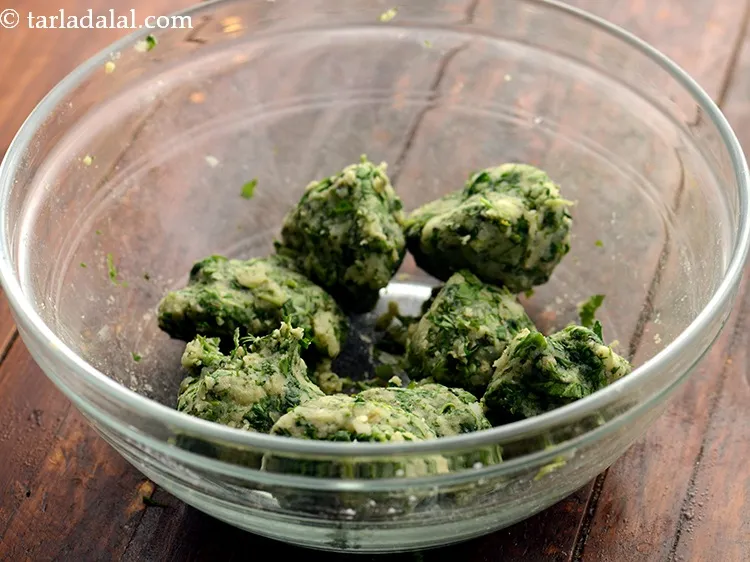 Step 28 – Combine all the ingredients and mix well. Divide the palak kofta mixture into 16 equal …