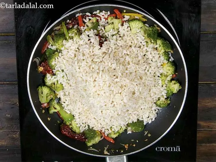 Step 16 – Add the cooked brown rice.