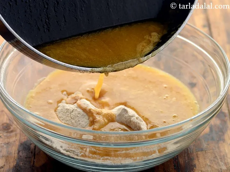 Step 11 – Add this butter mixture to the sieved flour mixture.