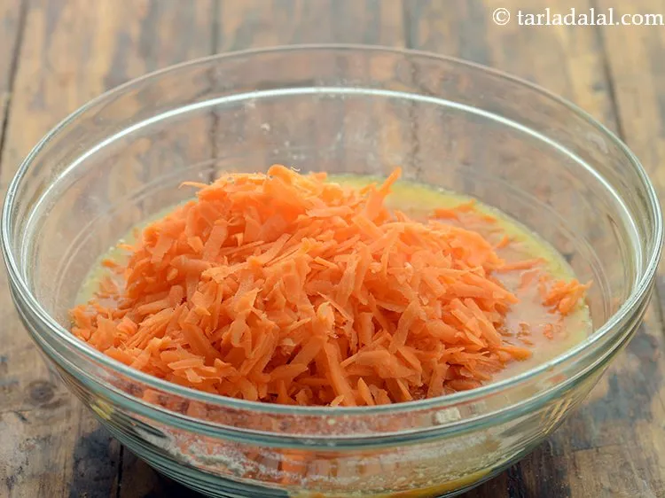 Step 12 – Finally add grated carrots also. Use the regular orange carrots, and not the red carrots. …