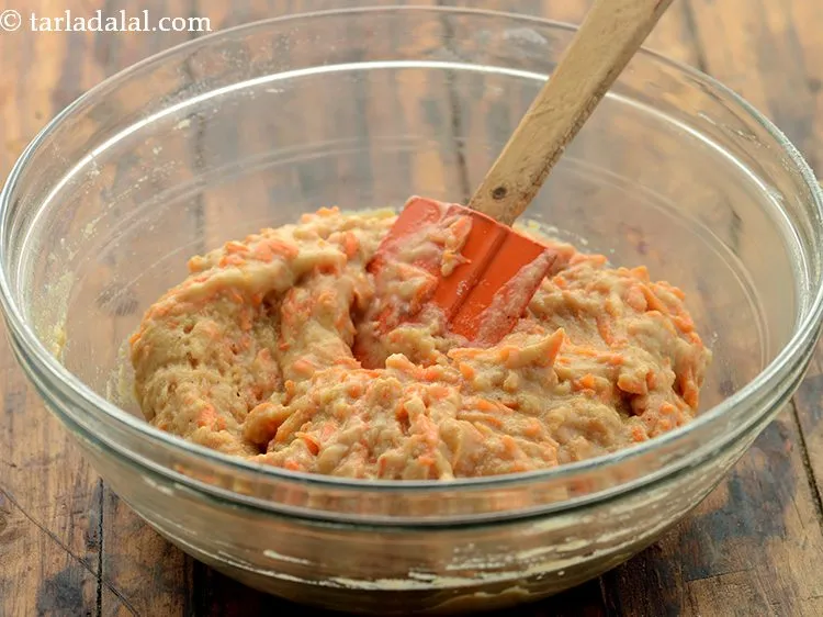 Step 13 – Mix well with the help of spatula. The mixture of <strong>healthy carrot cake recipe for …