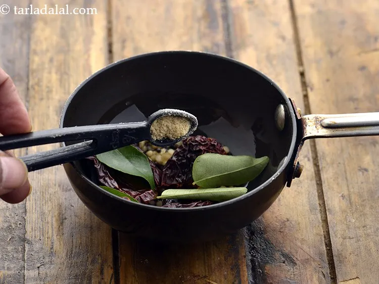 Step 22 – Add asafoetida and saut&eacute; on a medium flame for 10 seconds or until aromatic.