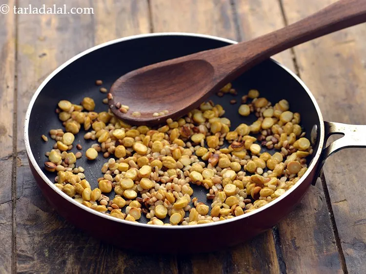 Step 5 – Stir and lightly roast them till they turn crisp and brown in colour.