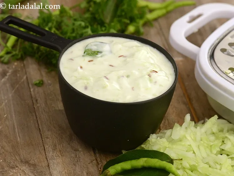 Step 20 – Refrigerate for at least 1 hour and serve<strong> low calorie cucumber raita </strong>chilled.