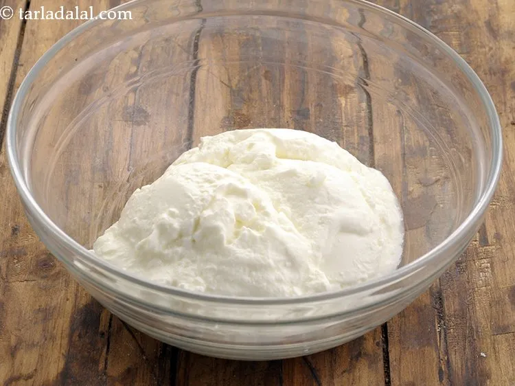 Step 14 – For preparing&nbsp;kadhi, in a deep bowl take curd. We have used&nbsp;<a href="https://www.tarladalal.com/Low-Fat-Curds--(-How-To-Make-Low-Fat-Curds)-8687r" target="_blank">homemade low-fat curd</a>, …