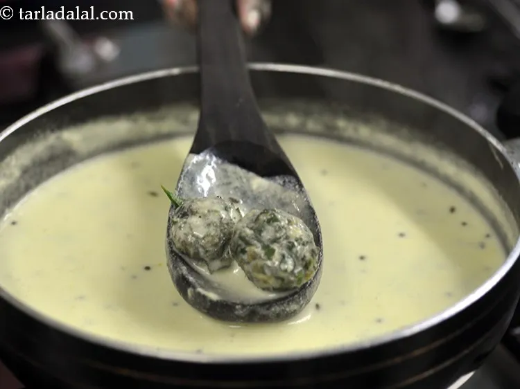 Step 32 – Mix gently and cook on a medium flame for 1 to 2 minutes. The koftas …