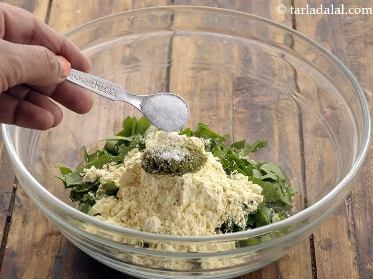 Step 7 – Add <a href="https://www.tarladalal.com/How-To-Make-Green-Chilli-Paste-42729r" target="_blank">green chilli paste</a> and salt to taste.