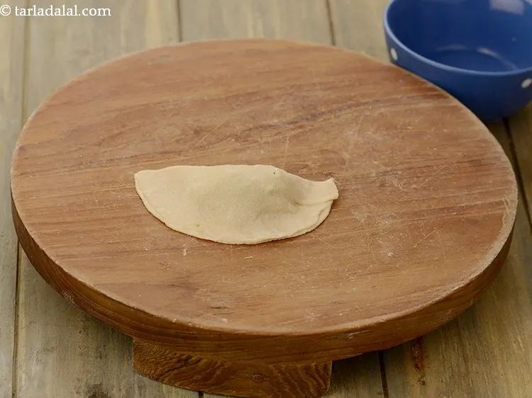 Step 16 – <p>Fold over to make a semi-circle and press the edges lightly with your fingers to …