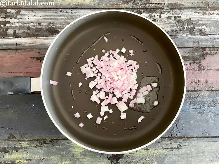 Step 10 – Add&nbsp;<meta charset="UTF-8" />1/2 cup&nbsp;<a href="glossary-chopped-onions-722i">chopped onions</a>.