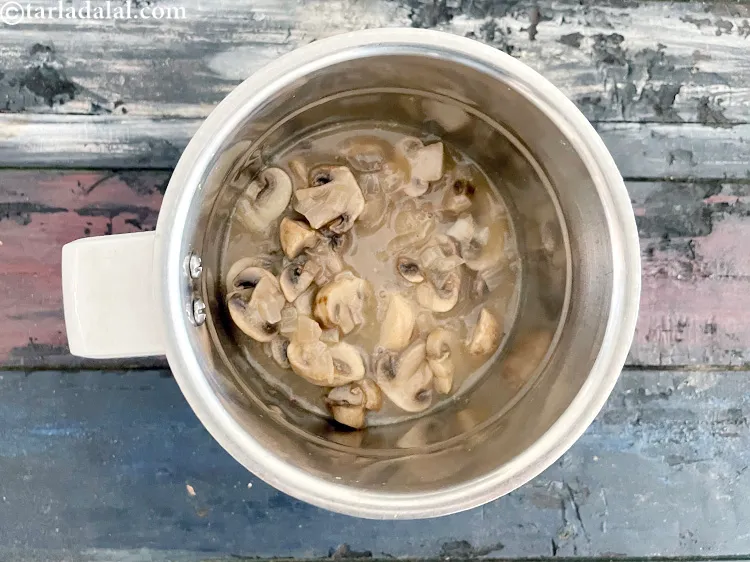 Step 19 – In a blender, put the cooled mushroom mixture.