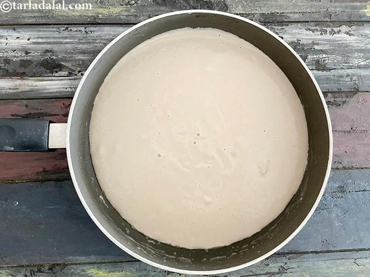 Step 22 – Transfer the mixture into the same deep non-stick pan.