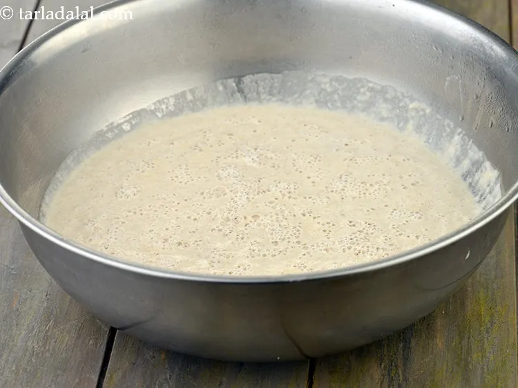 Step 22 – Mix the batter very well using a spoon. This batter should be of pouring consistency.&nbsp;