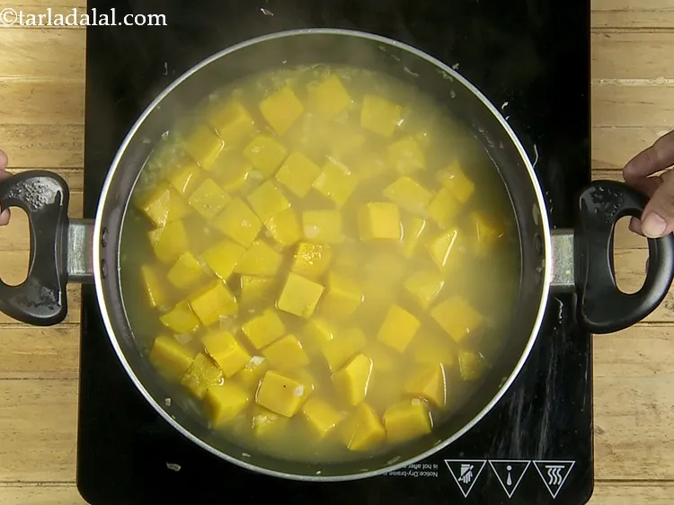 Step 17 – Place the chopped pumpkin in it and cook it on a medium flame till they …