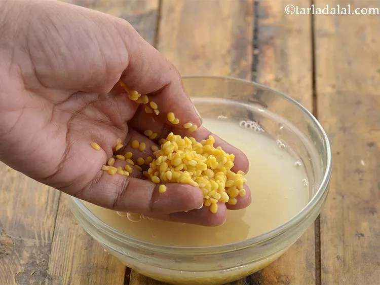 Step 27 – <meta charset="UTF-8" />Wash the yellow moong dal well with water to remove any sort of …