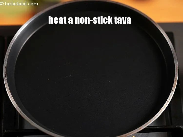 Step 35 – Heat a non-stick tava (griddle).