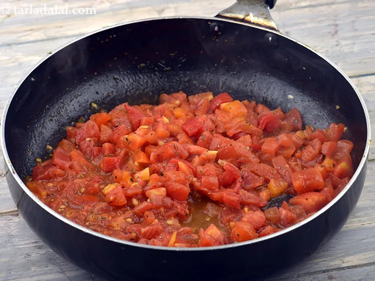 Step 59 – Mix well and cook on a medium flame for 1 minute.