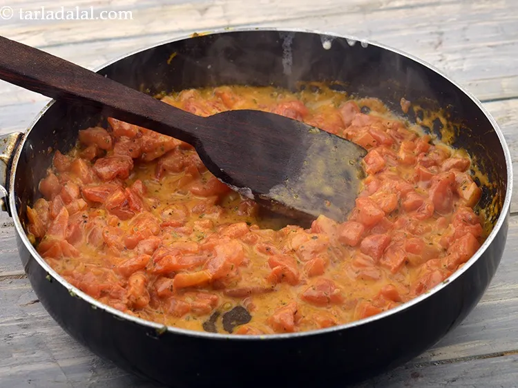 Step 64 – Mix well and cook on a medium flame for 2 minutes, while stirring occasionally. Keep …