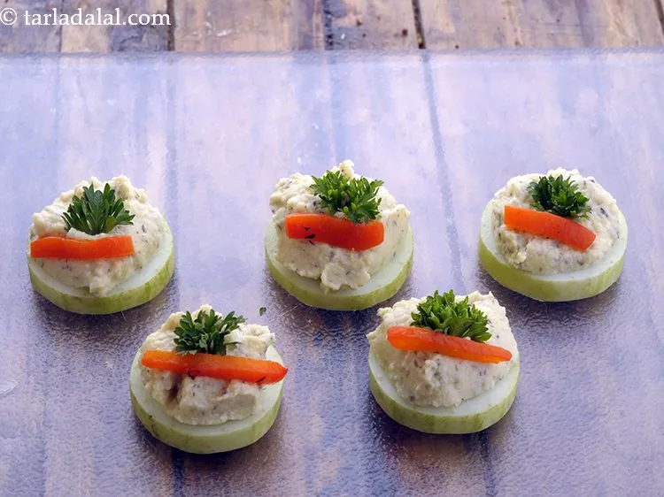 Step 33 – Also, garnish the<strong> herbed cucumber bites</strong> with parsley sprigs. If you don&rsquo;t find them then …