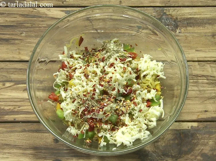 Step 11 – Add 1 tsp&nbsp;<a href="https://www.tarladalal.com/glossary-dried-mixed-herbs-466i">dried mixed herbs</a>.