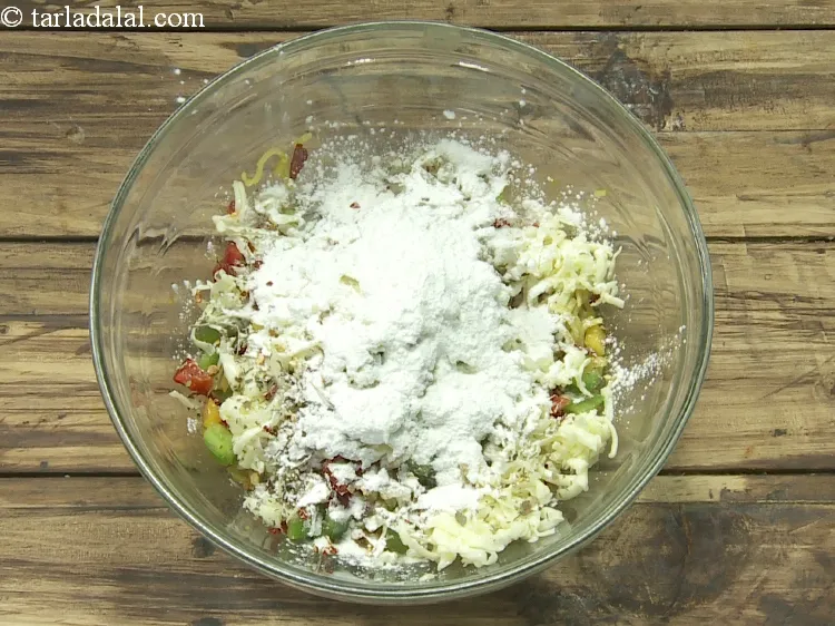 Step 12 – Add 2 tbsp&nbsp;<a href="https://www.tarladalal.com/glossary-cornflour-cornstarch-maize-starch-corn-flour-112i">cornflour</a>. it helps in binding the mixture.