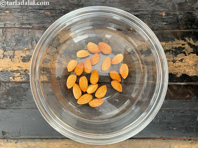 Step 7 – Add enough water to cover the almonds.