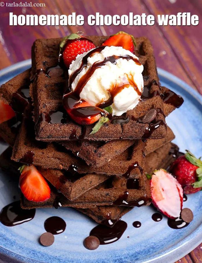 Step 17 – Serve <strong>eggless chocolate waffles </strong>immediately with toppings of your choice like vanilla ice cream, strawberries, …