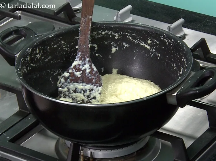 Step 11 – Continue cooking for 1 more minute, while stirring continuously and scraping the sides of the …