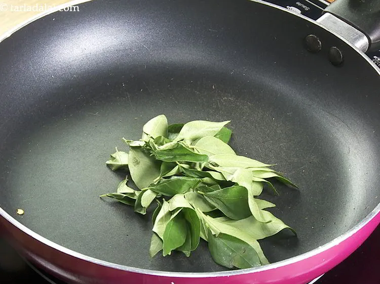 Step 17 – Finally add the curry leaves in the pan. This healthy ingredient in toasted form lends …
