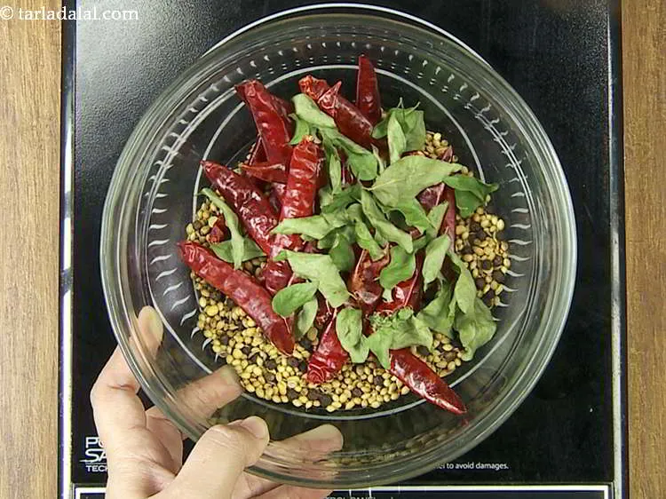 Step 19 – Transfer it into the same bowl. If there is any moisture left in curry leaves …