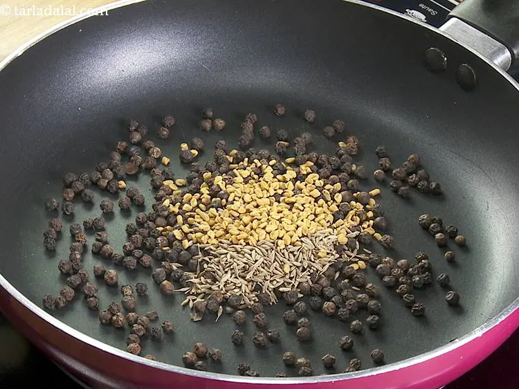 Step 8 – Add fenugreek seeds. They add a unique aroma to the rasam powder.