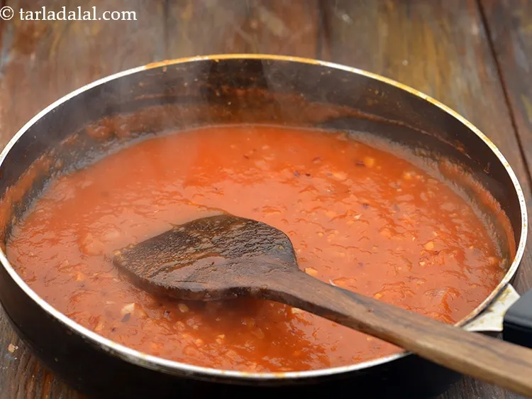 Step 70 – Mix well and cook on a medium flame for 2 minutes, while stirring occasionally.
