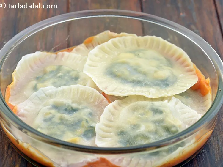 Step 74 – Place 5 raviolis over it.