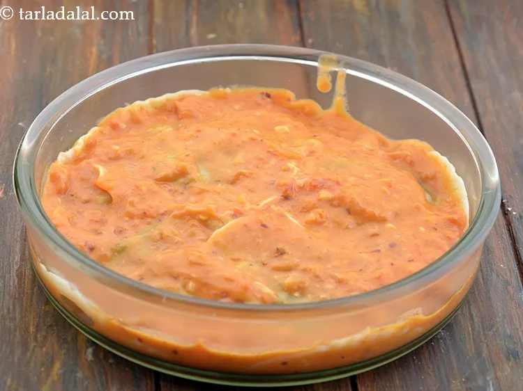 Step 75 – Pour &frac12; cup of pink sauce evenly over it.