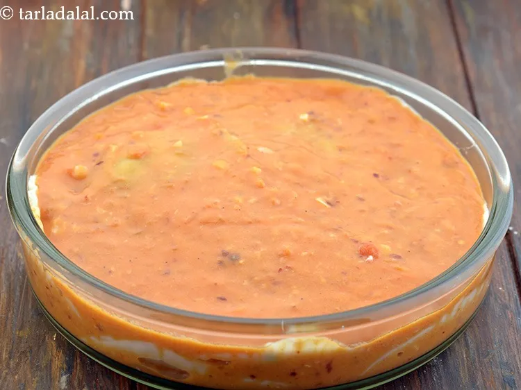 Step 77 – Finally pour the remaining pink sauce evenly over it.