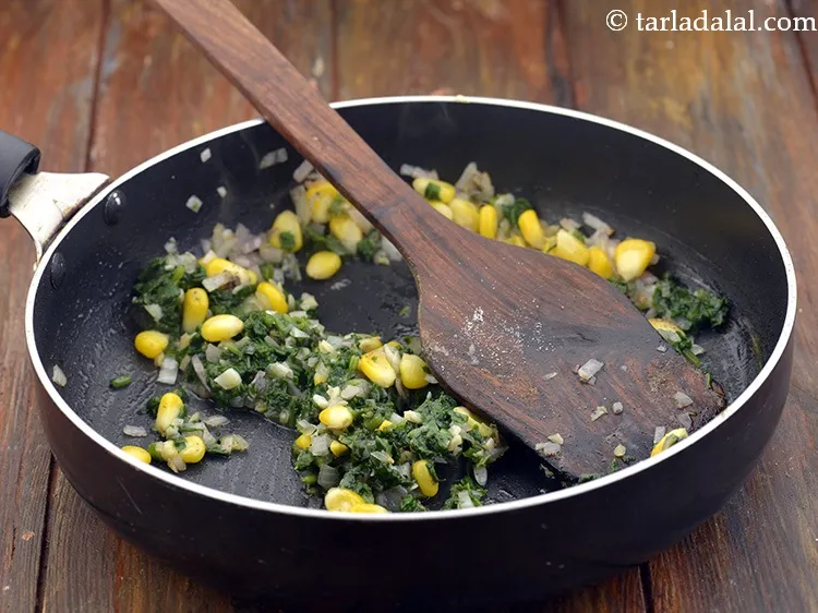 Step 35 – Mix well and cook on a medium flame for 1 minute.