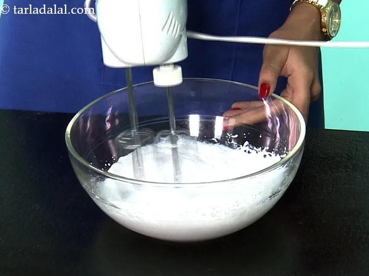 Step 5 – Start beating with an electric beater.