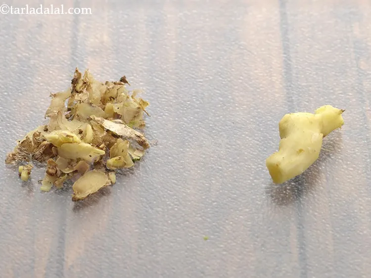 Step 5 – Peel&nbsp;the outer skin using the blunt end of the knife or a peeler.