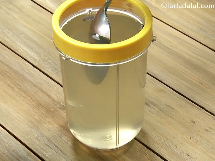 Step 6 – Mix <strong>Honey Lemon Water ( Madh ka pani)</strong> very well, using a spoon.