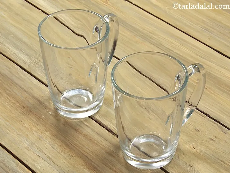 Step 7 – To serve <strong>Lemon honey water</strong>, take 2 glasses.