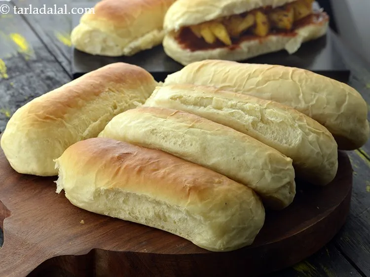 Step 25 – Learn <a href="https://www.tarladalal.com/hot-dog-roll-homemade-indian-hot-dog-buns-41669r" target="_blank"><strong>how to make hot dog roll at home</strong></a>.&nbsp;